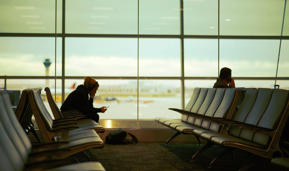 man sitting in airport